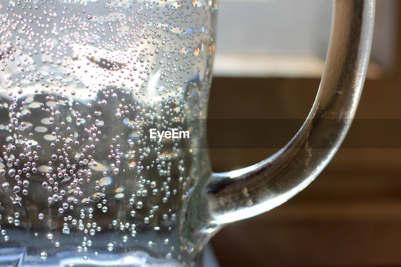 CLOSE-UP OF COFFEE ON TABLE AT HOME