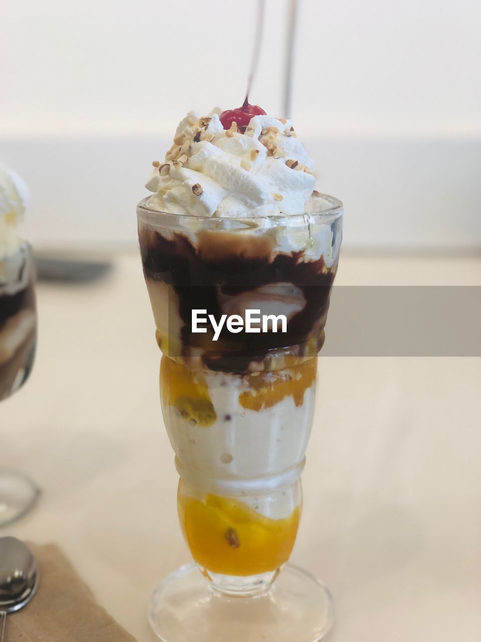 Close-up of ice cream in glass on table