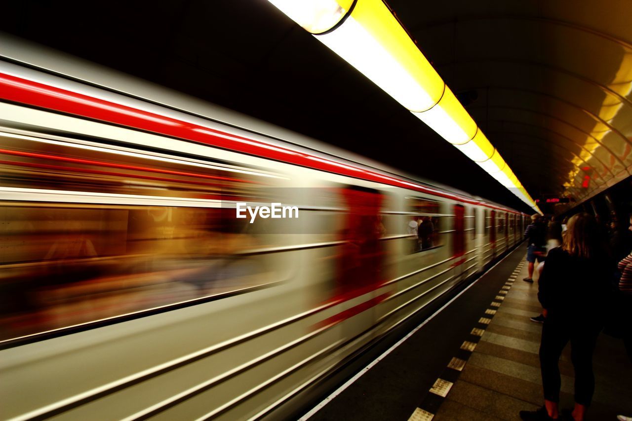 TRAIN AT RAILROAD STATION PLATFORM