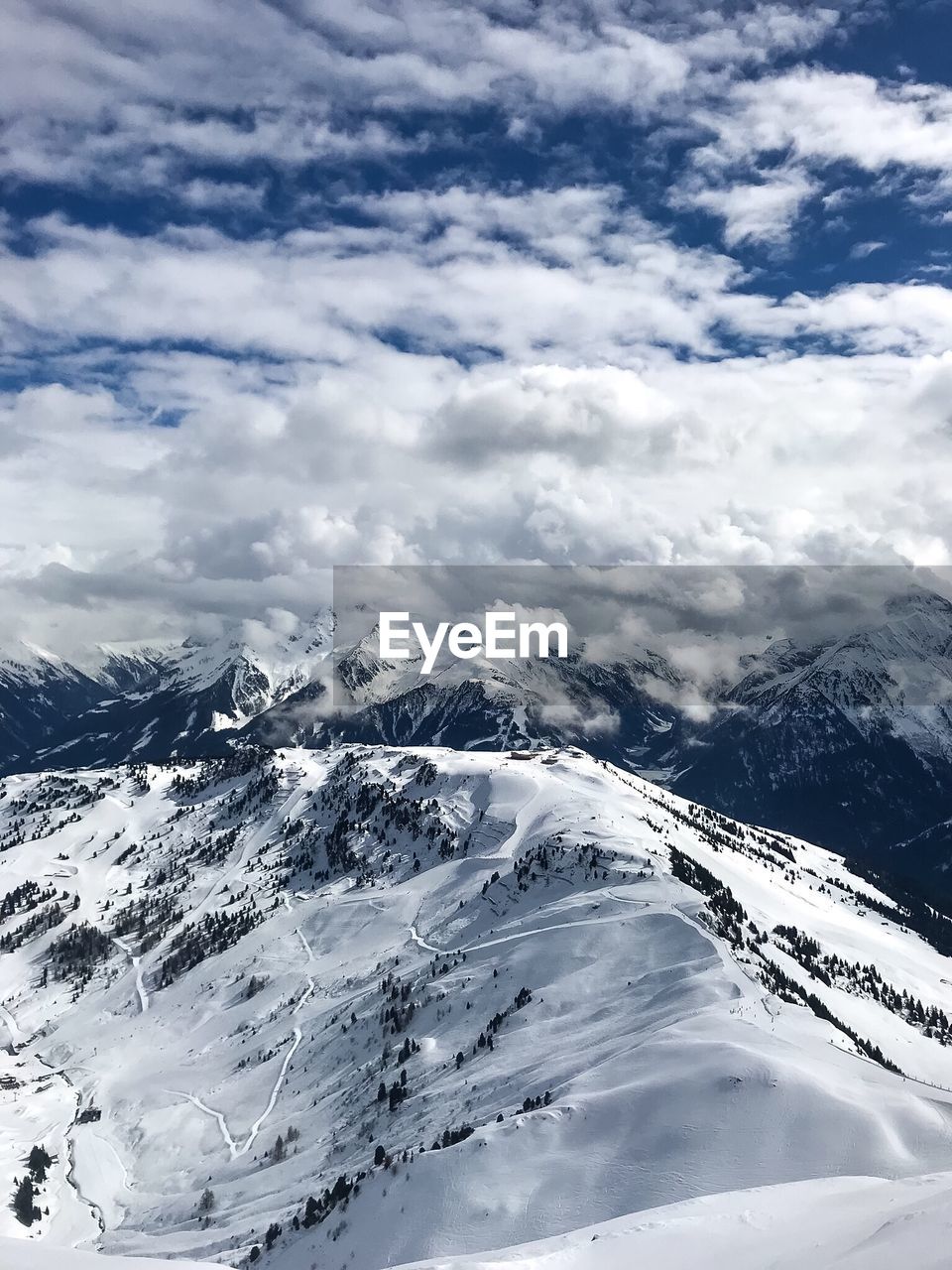 Sky and snow covered mountains. scenic view of snowcapped mountains against sky