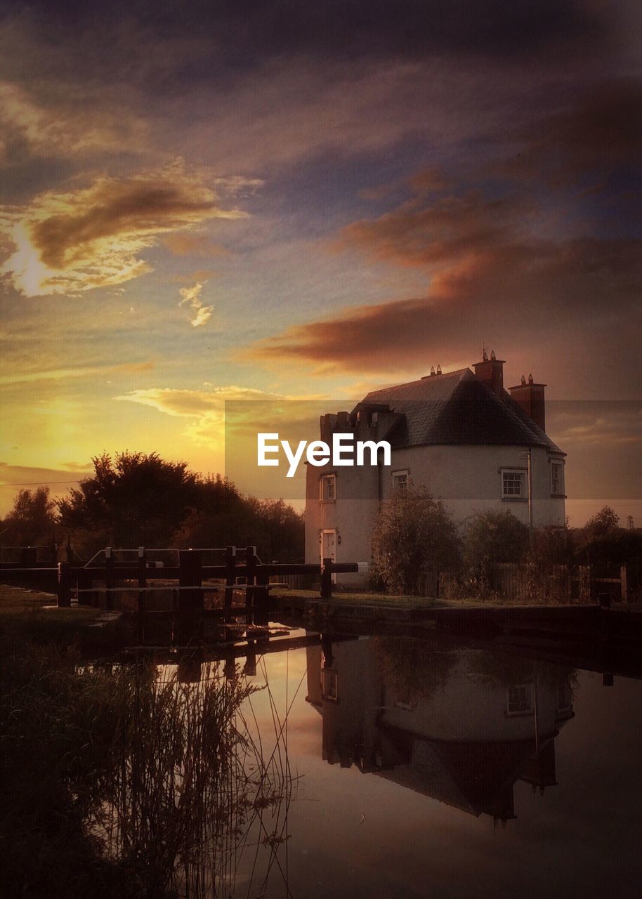 VIEW OF RIVER AT SUNSET