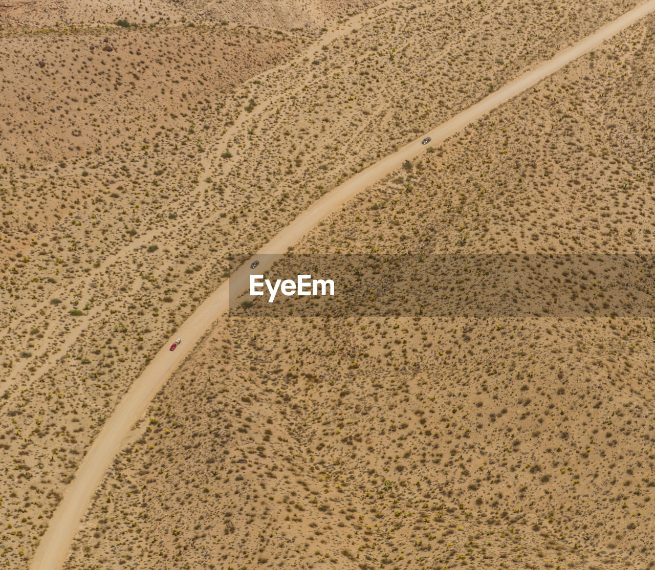 High angle view of vehicles on country road