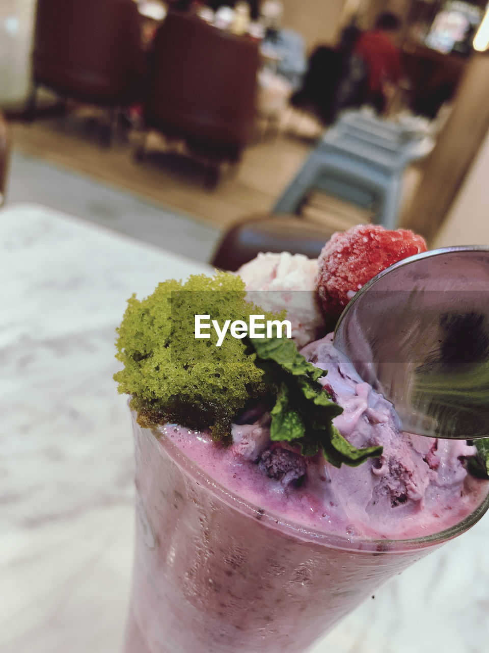 CLOSE-UP OF ICE CREAM IN GLASS