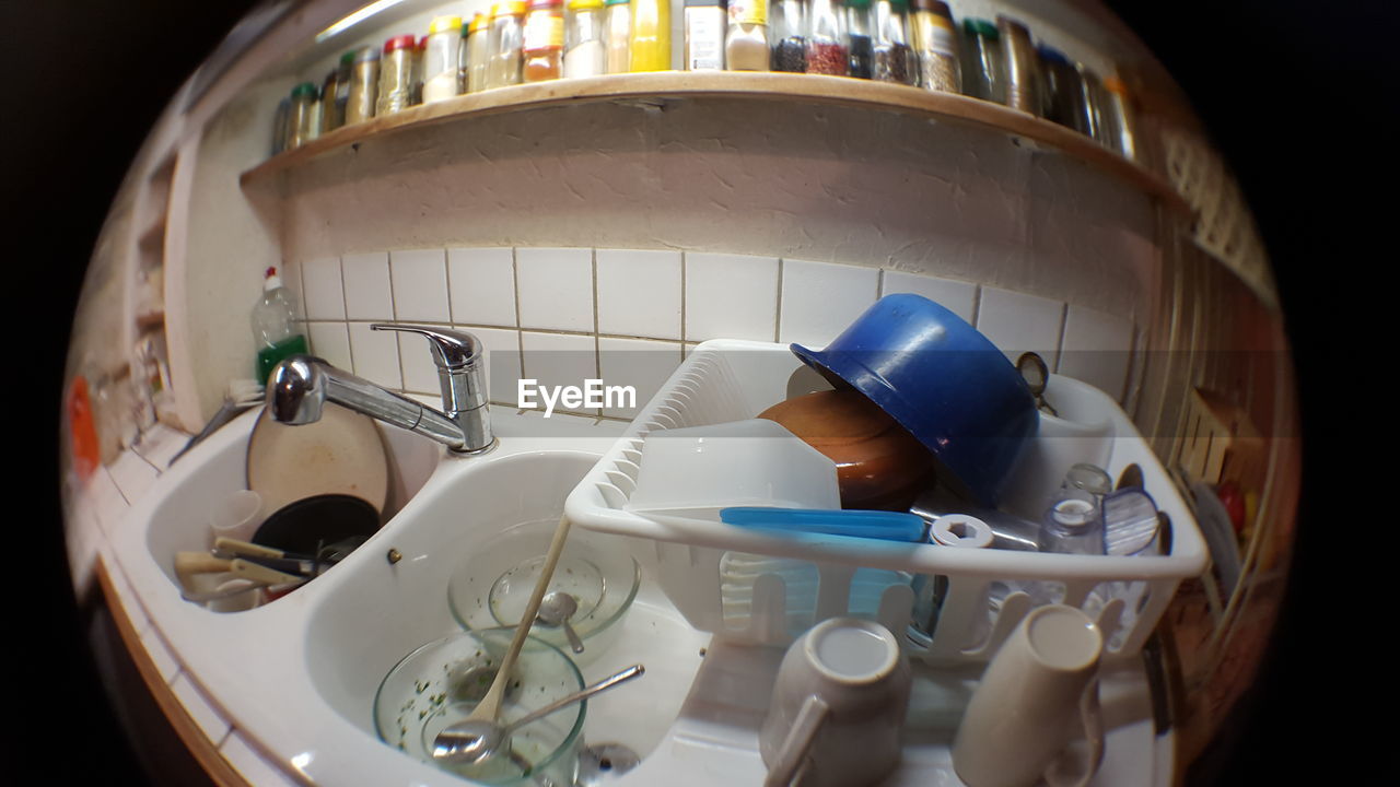 High angle view of dirty dishes in sink