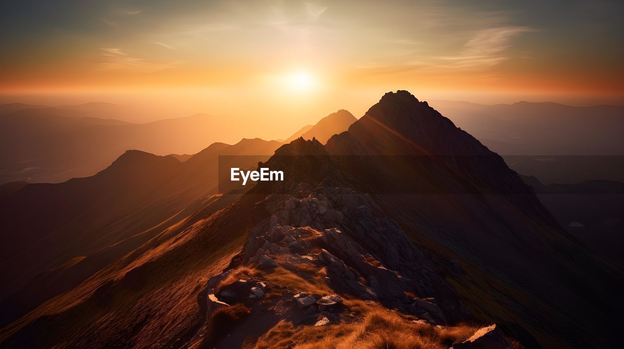 scenic view of mountain against sky during sunset