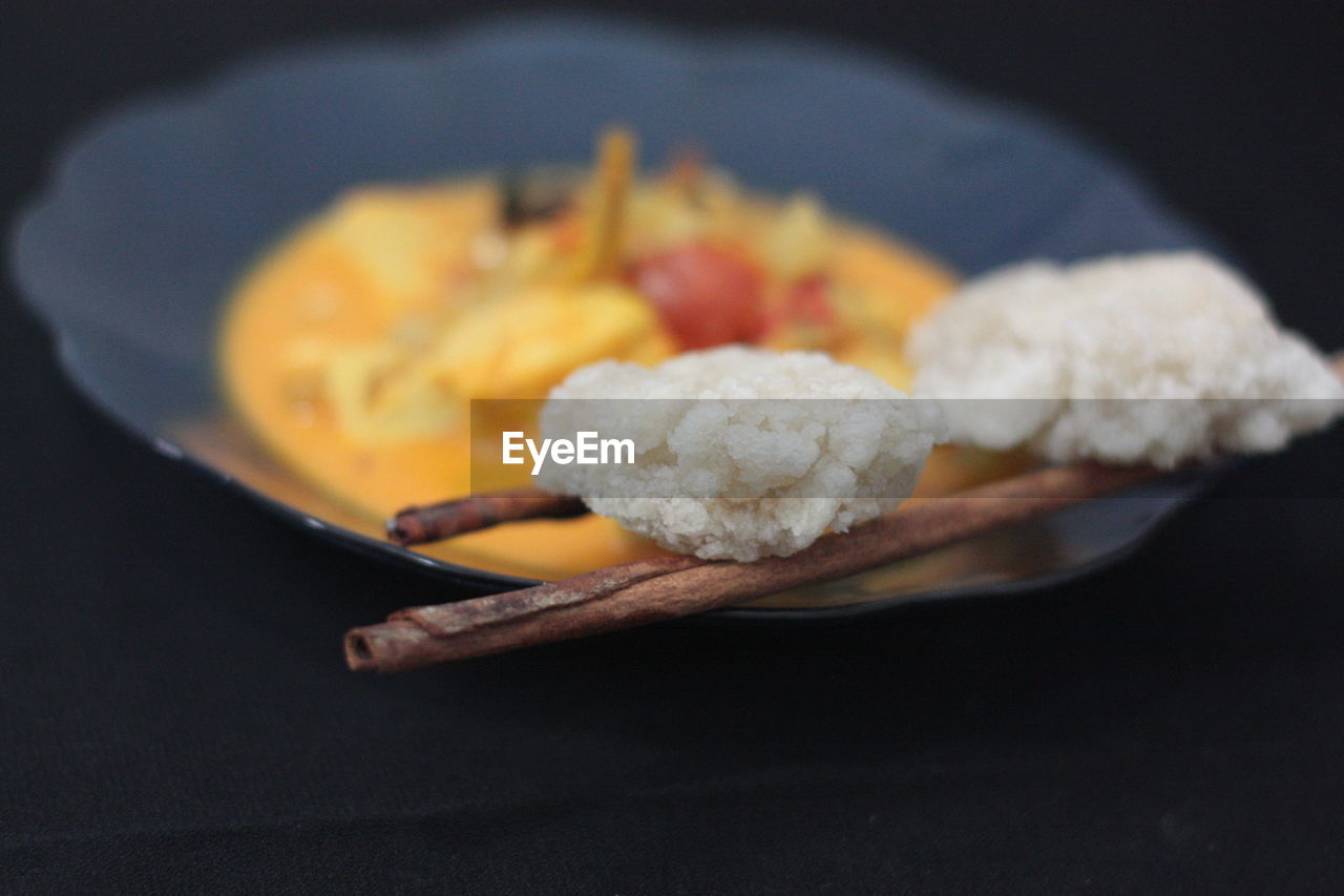 Close-up of breakfast served on table