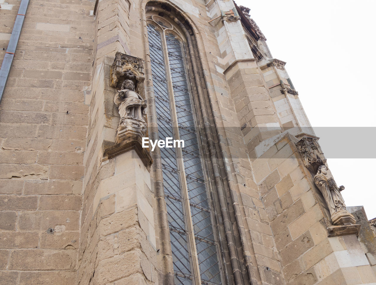 LOW ANGLE VIEW OF BELL TOWER OF CATHEDRAL