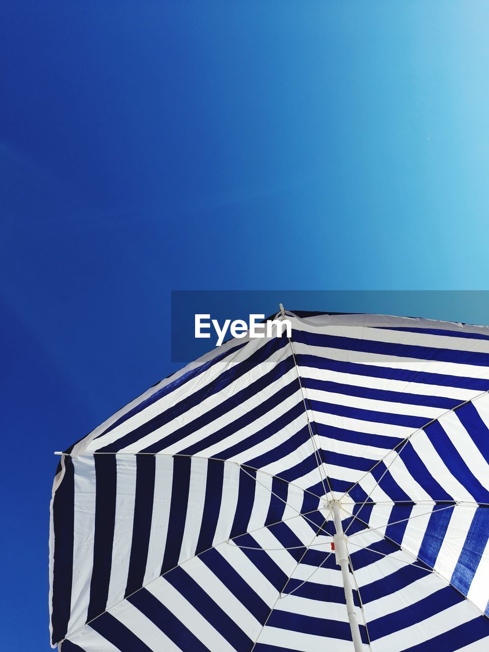 Sunbrella on blue sky