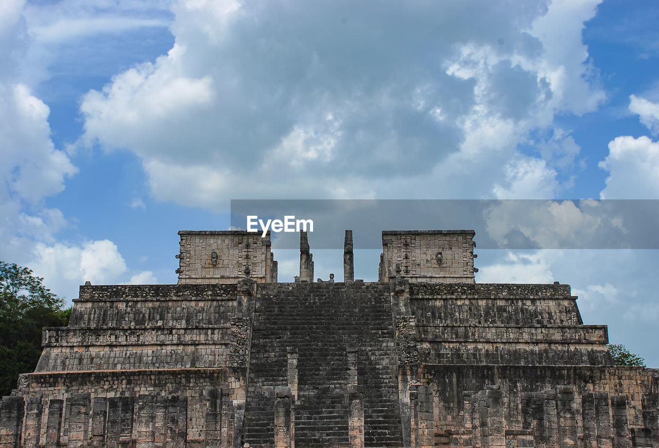 The maya ruins at chichen itza in in the jungle of the yucatan in mexico