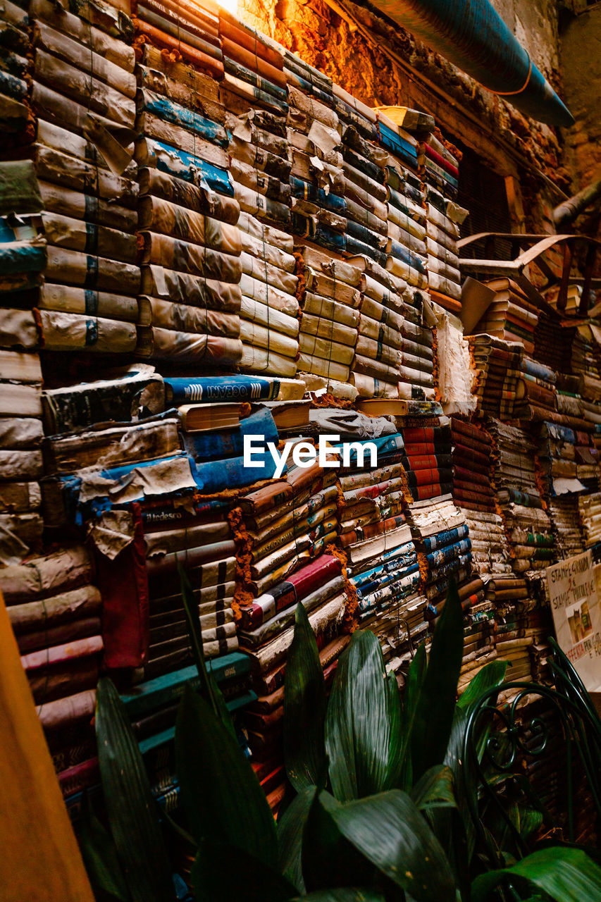 Books piled up in the famous high water bookstore, libreria acqua alta