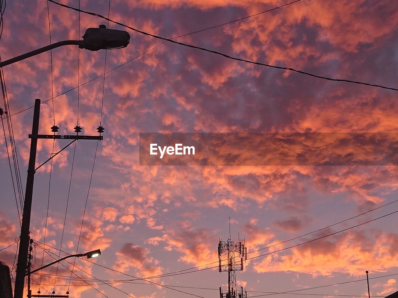 LOW ANGLE VIEW OF ELECTRICITY PYLON AGAINST SKY