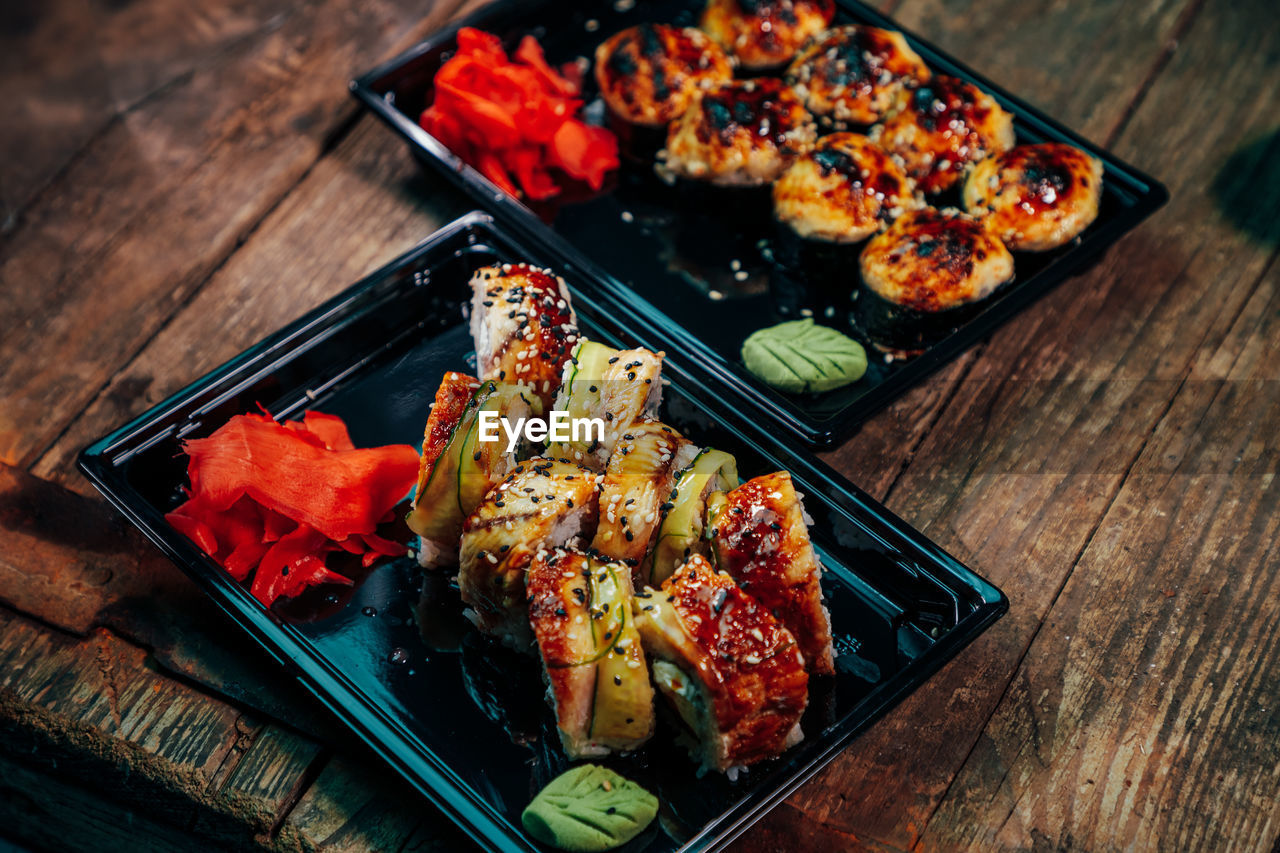 HIGH ANGLE VIEW OF MEAT ON TABLE