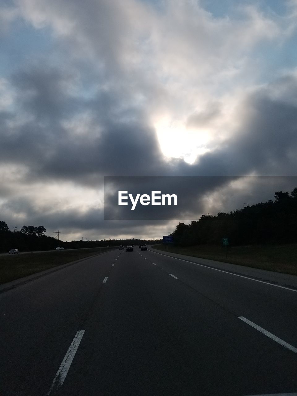 ROAD PASSING THROUGH CLOUDS