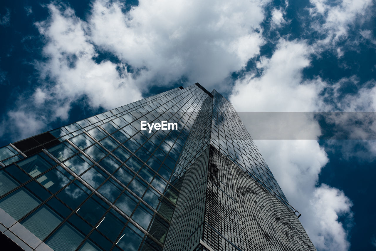 LOW ANGLE VIEW OF MODERN BUILDINGS AGAINST SKY