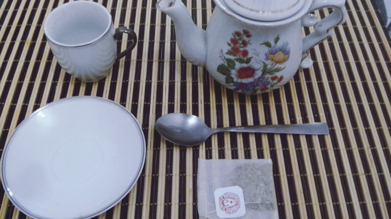 Close-up of teapot and cup of tea