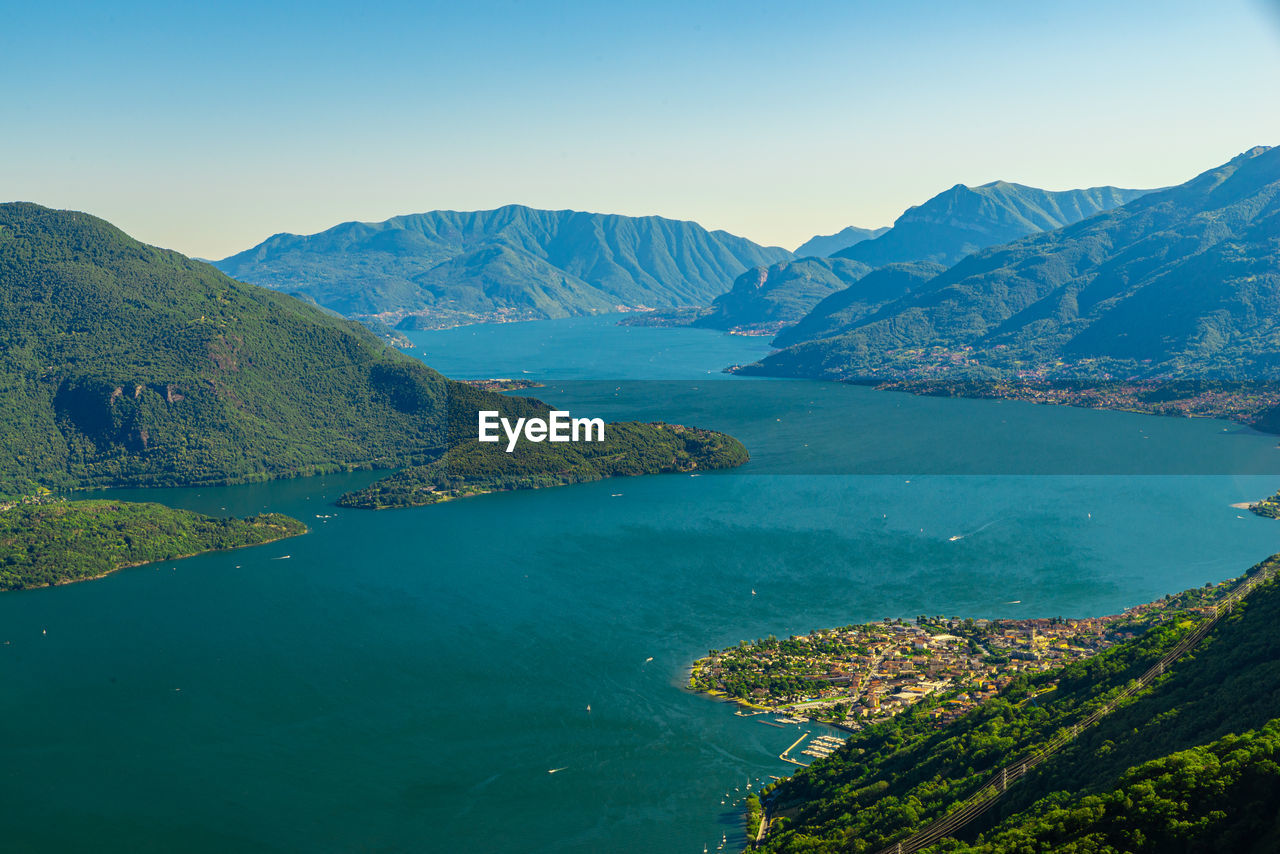 Panorama on lake of como, with villages of gera lario, domaso, and the mountains that overlook them.