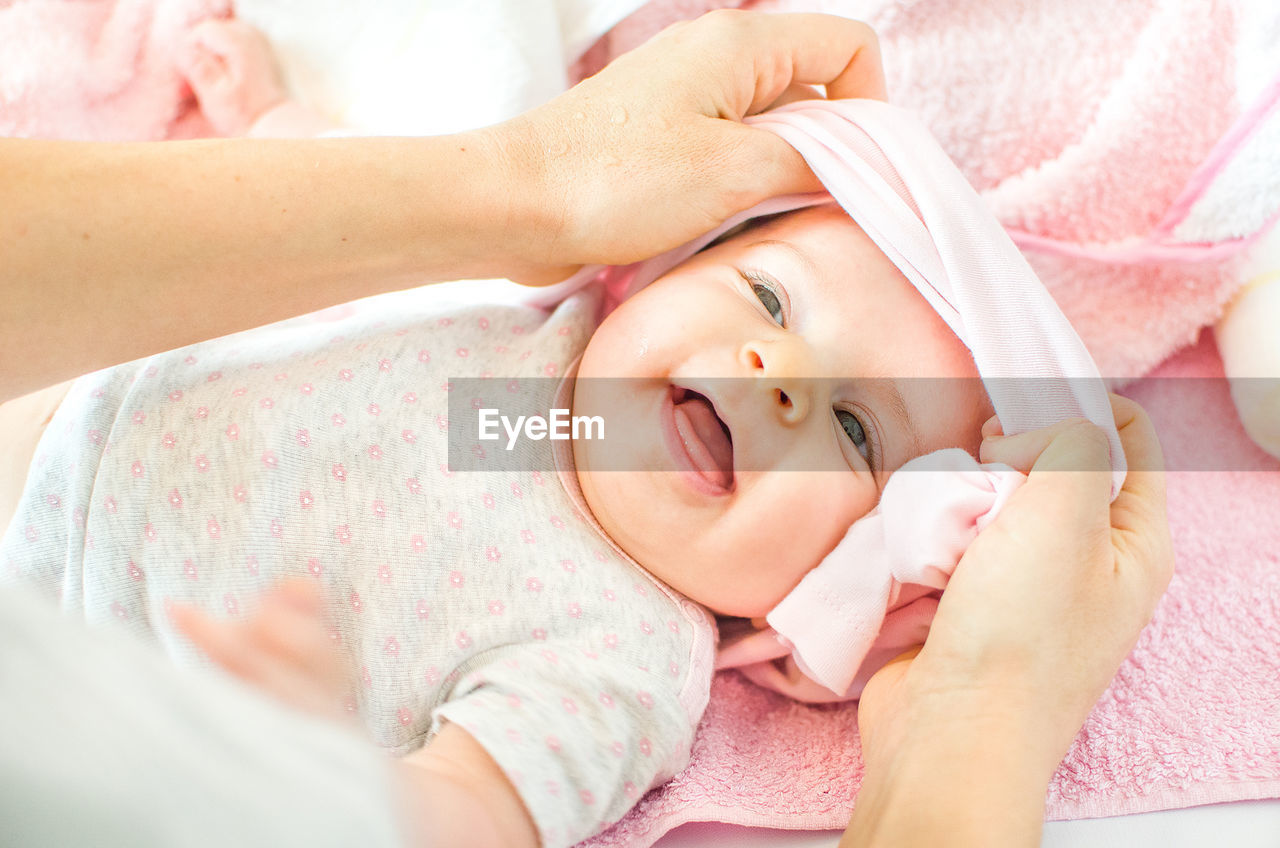 Dressing newborn baby pink