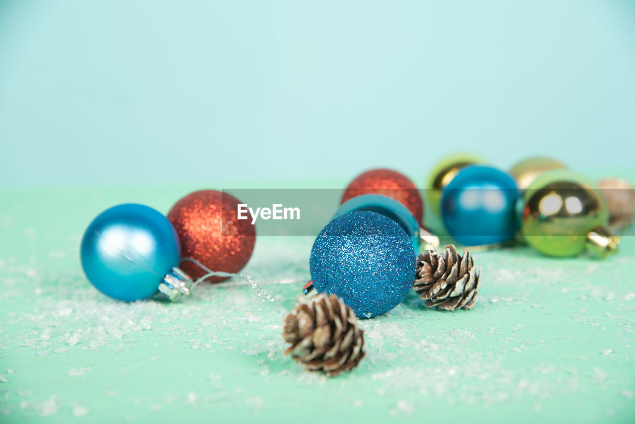 Close-up of christmas decorations on table