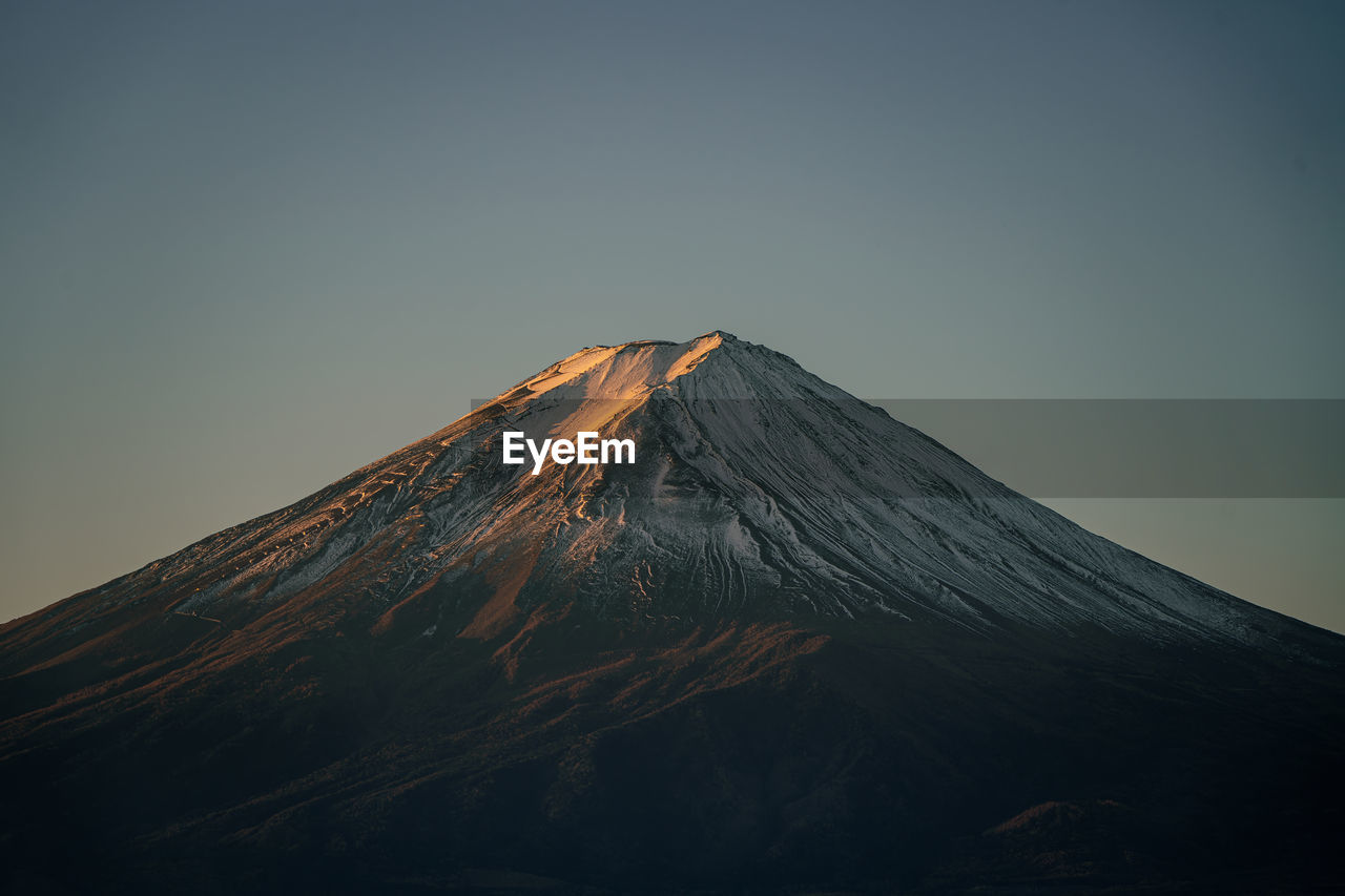 scenic view of snowcapped mountain against sky