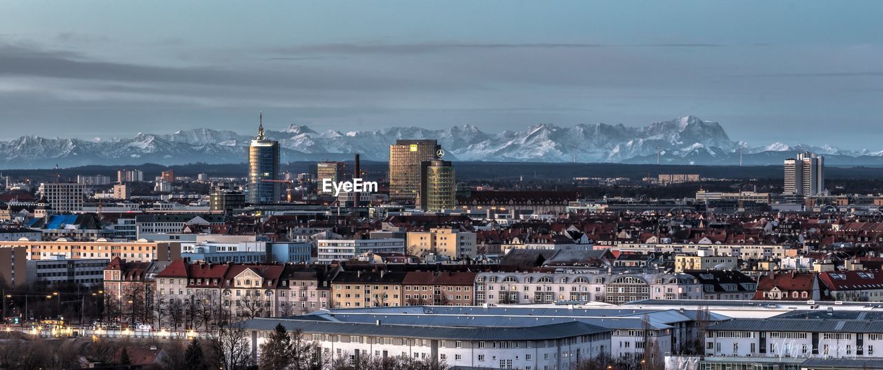 High angle view of buildings in city against sky