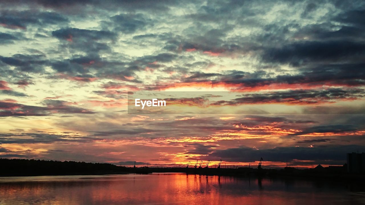 SCENIC VIEW OF DRAMATIC SKY DURING SUNSET