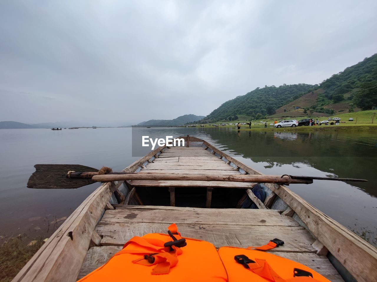 PIER AMIDST LAKE AGAINST SKY