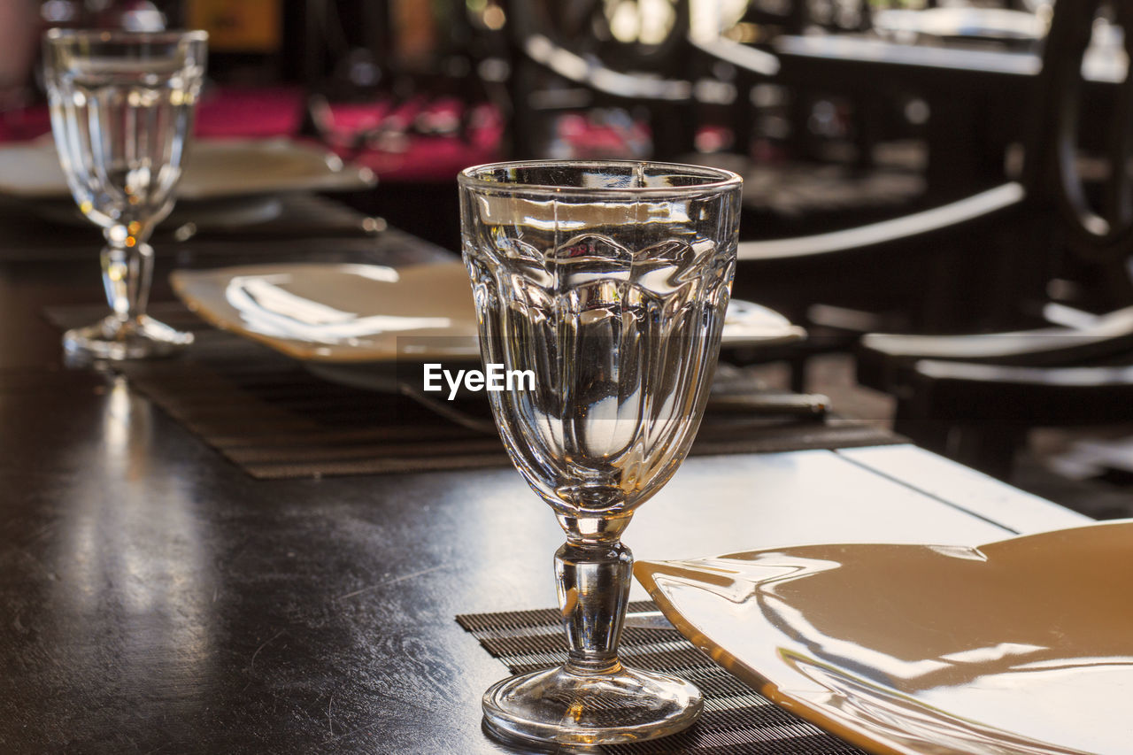 Close-up of wine in glass on table