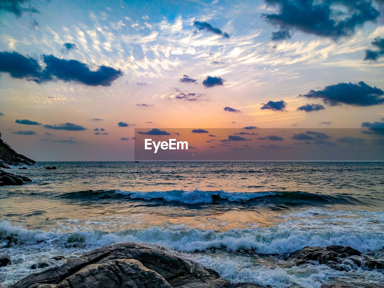 Scenic view of sea against sky during sunset