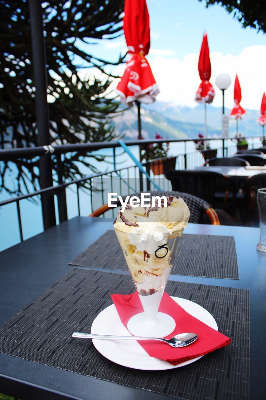 Close-up of ice cream on table in cafe