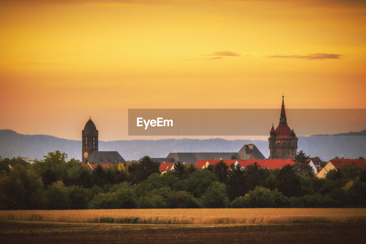 VIEW OF TOWER AT SUNSET