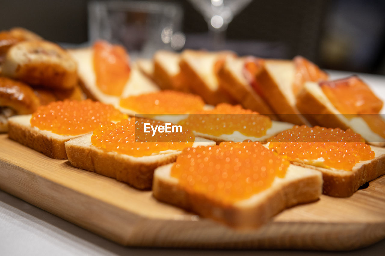 food and drink, food, meal, freshness, breakfast, dish, indoors, no people, produce, healthy eating, close-up, slice, bread, selective focus, dessert, baked, fruit, wellbeing, cuisine, sweet food, snack, table, cutting board