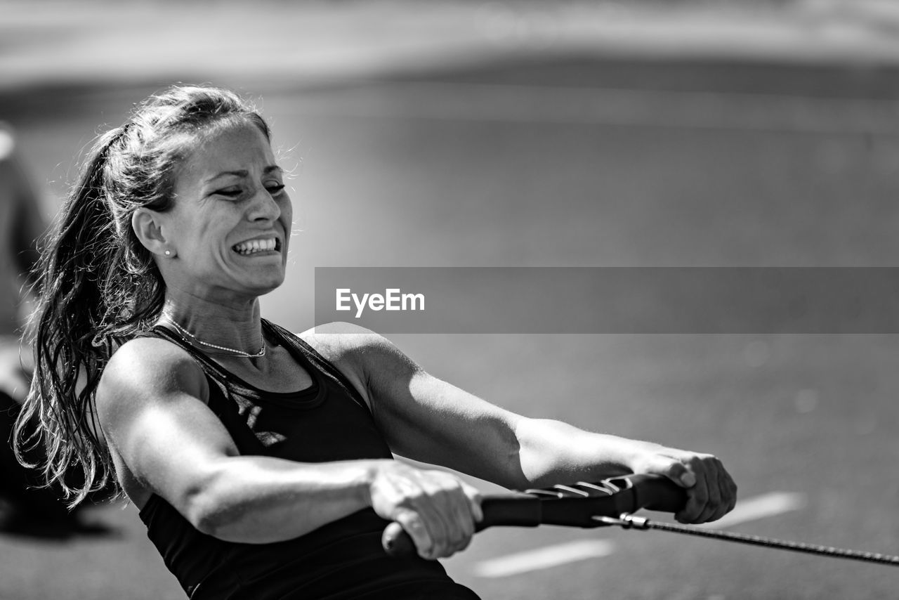 Athlete exercising on equipment