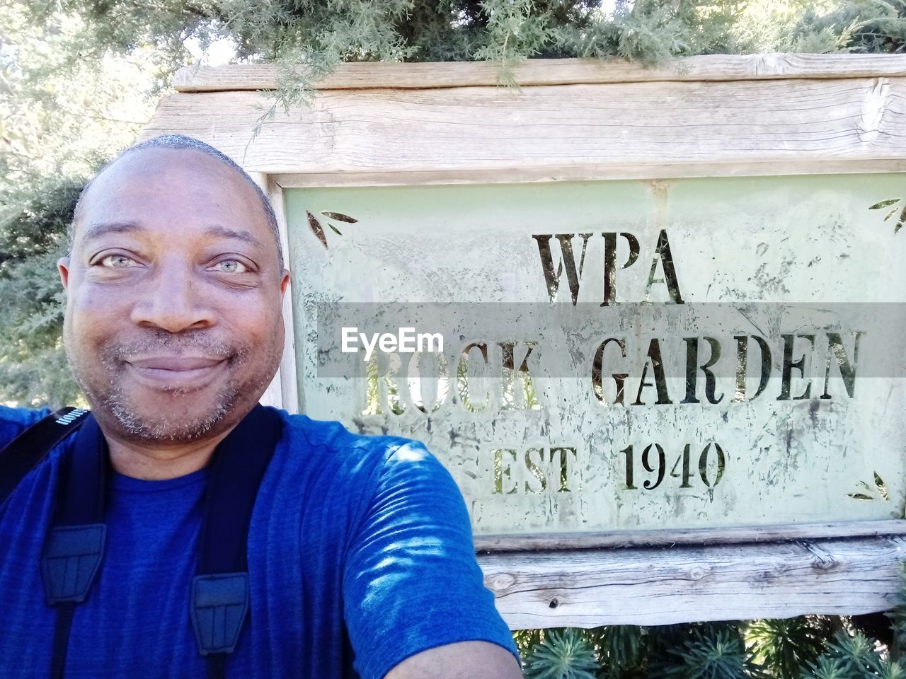 PORTRAIT OF HAPPY MAN WITH TEXT