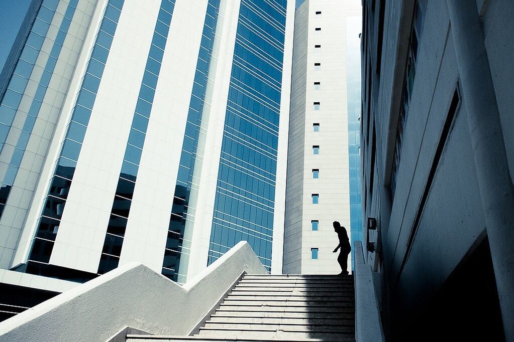 LOW ANGLE VIEW OF MODERN BUILDINGS IN CITY