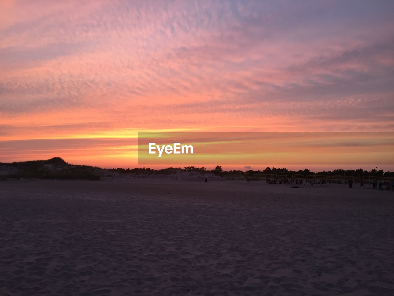 SCENIC VIEW OF LAND DURING SUNSET AGAINST SKY