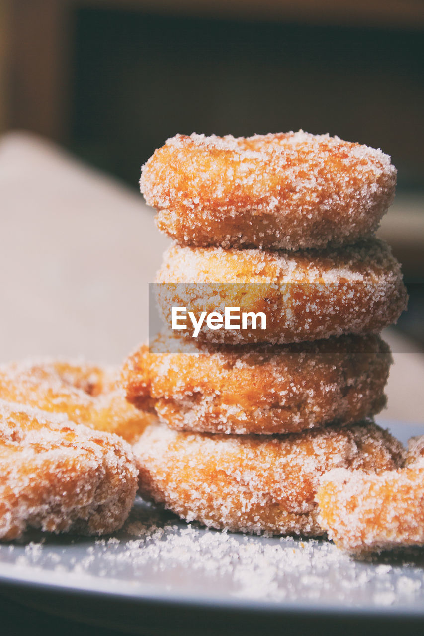 Close-up of donuts on plate