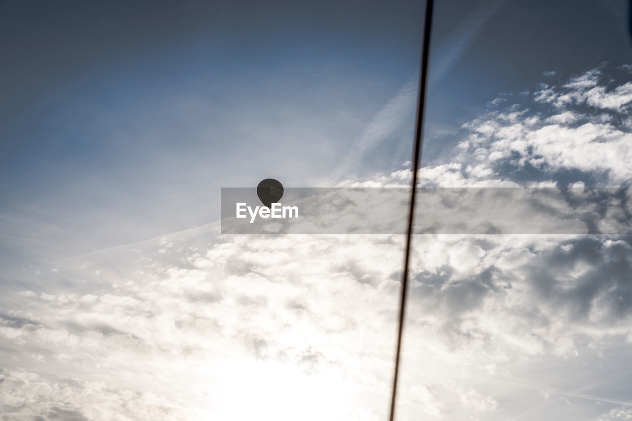 LOW ANGLE VIEW OF HOT AIR BALLOON