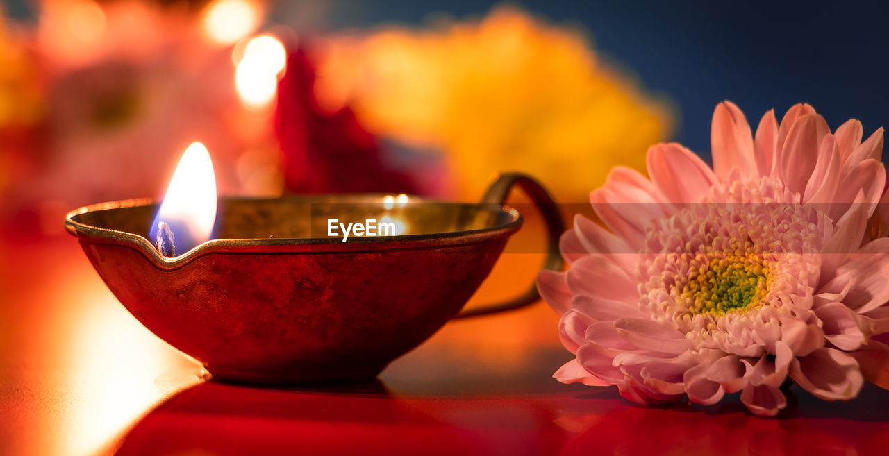 close-up of illuminated tea light candle