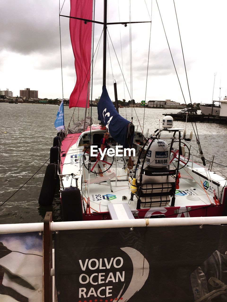 BOATS MOORED IN HARBOR