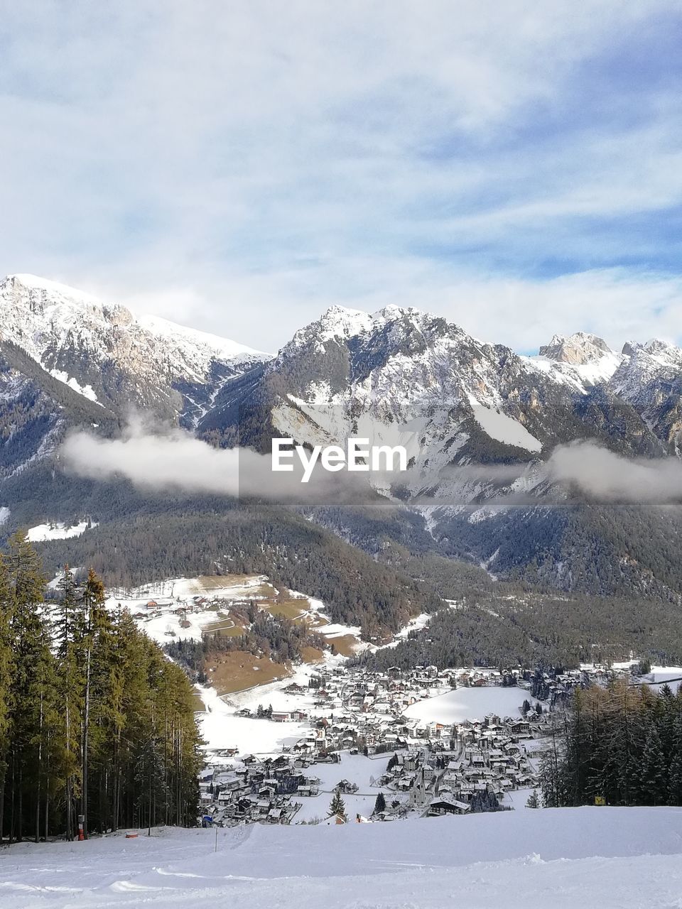 SNOW COVERED MOUNTAIN AGAINST SKY