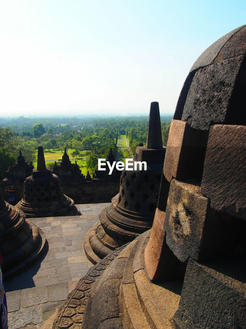 Stupas of borobudur temple against sky