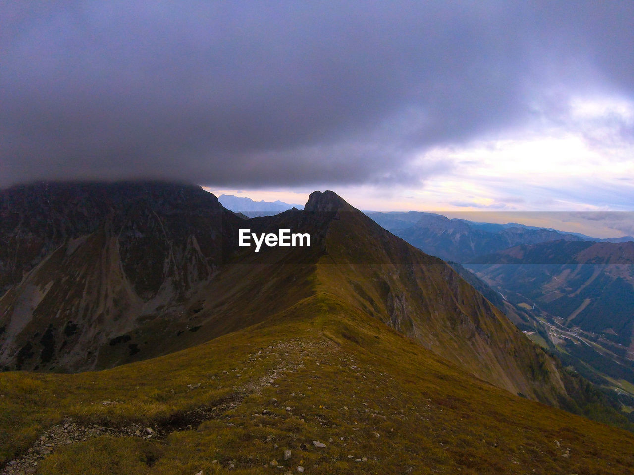 SCENIC VIEW OF MOUNTAIN AGAINST SKY DURING SUNSET