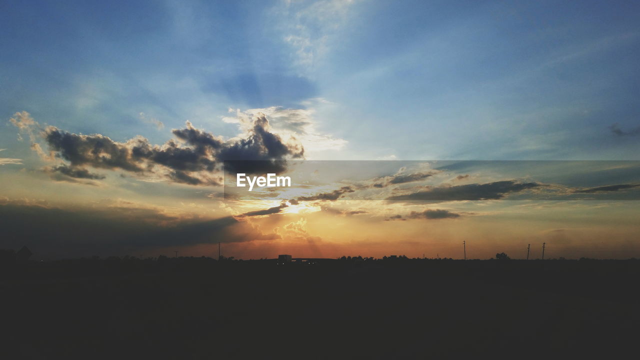 SILHOUETTE OF LANDSCAPE DURING SUNSET