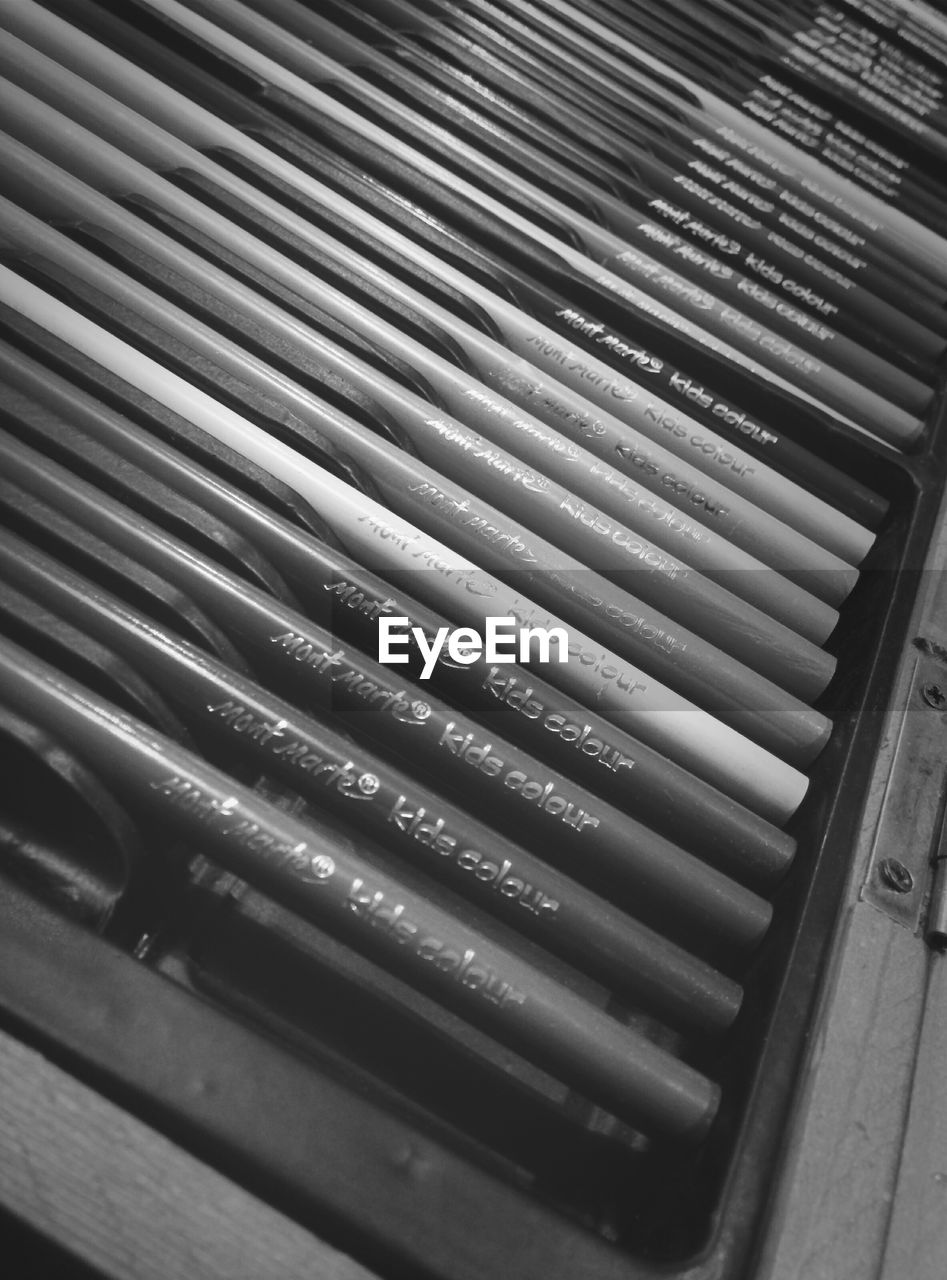 Close-up of sketch pens arranged in box
