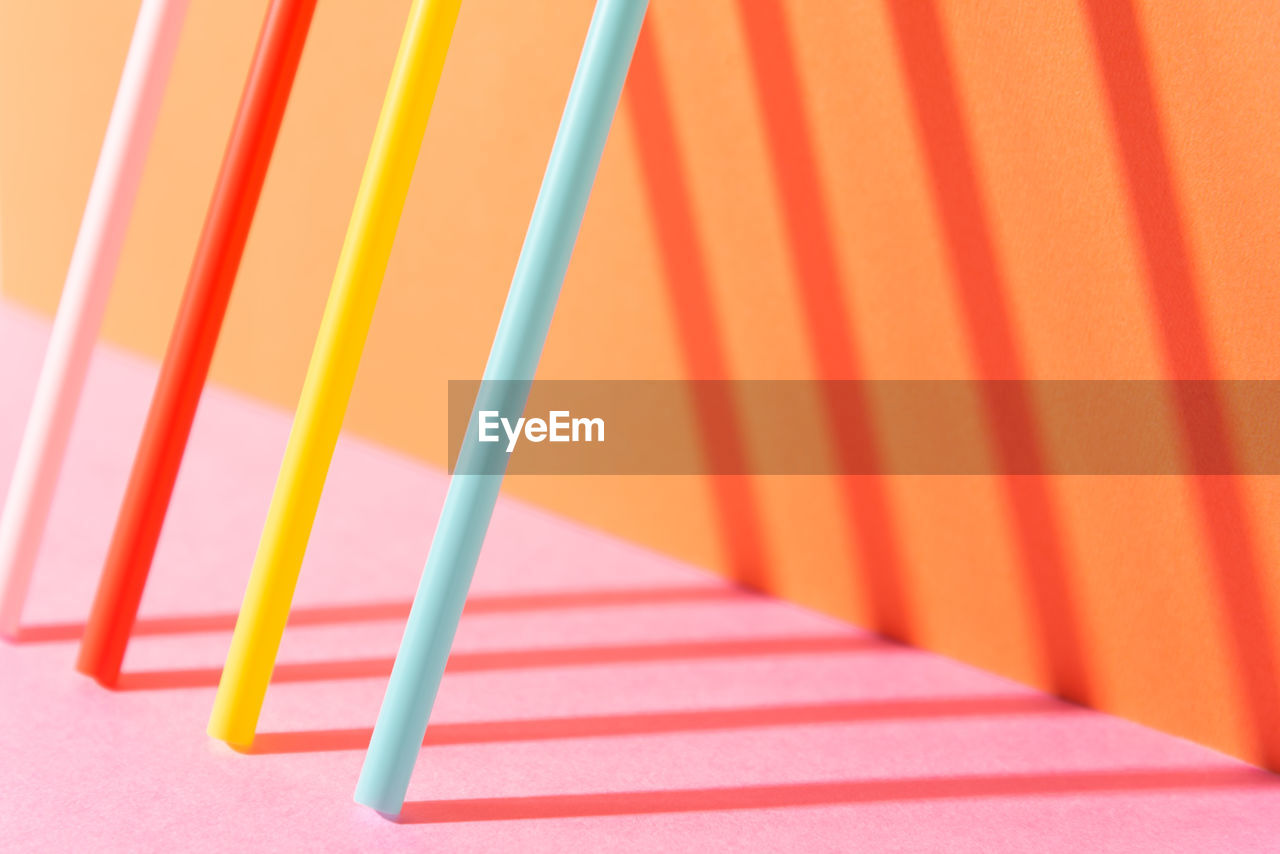 Close-up of drinking straws