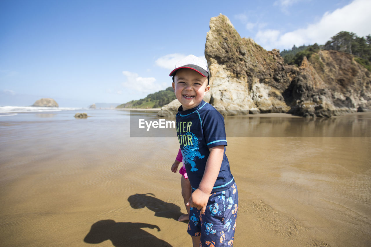 Portrait of smiling happy boy at the beach.