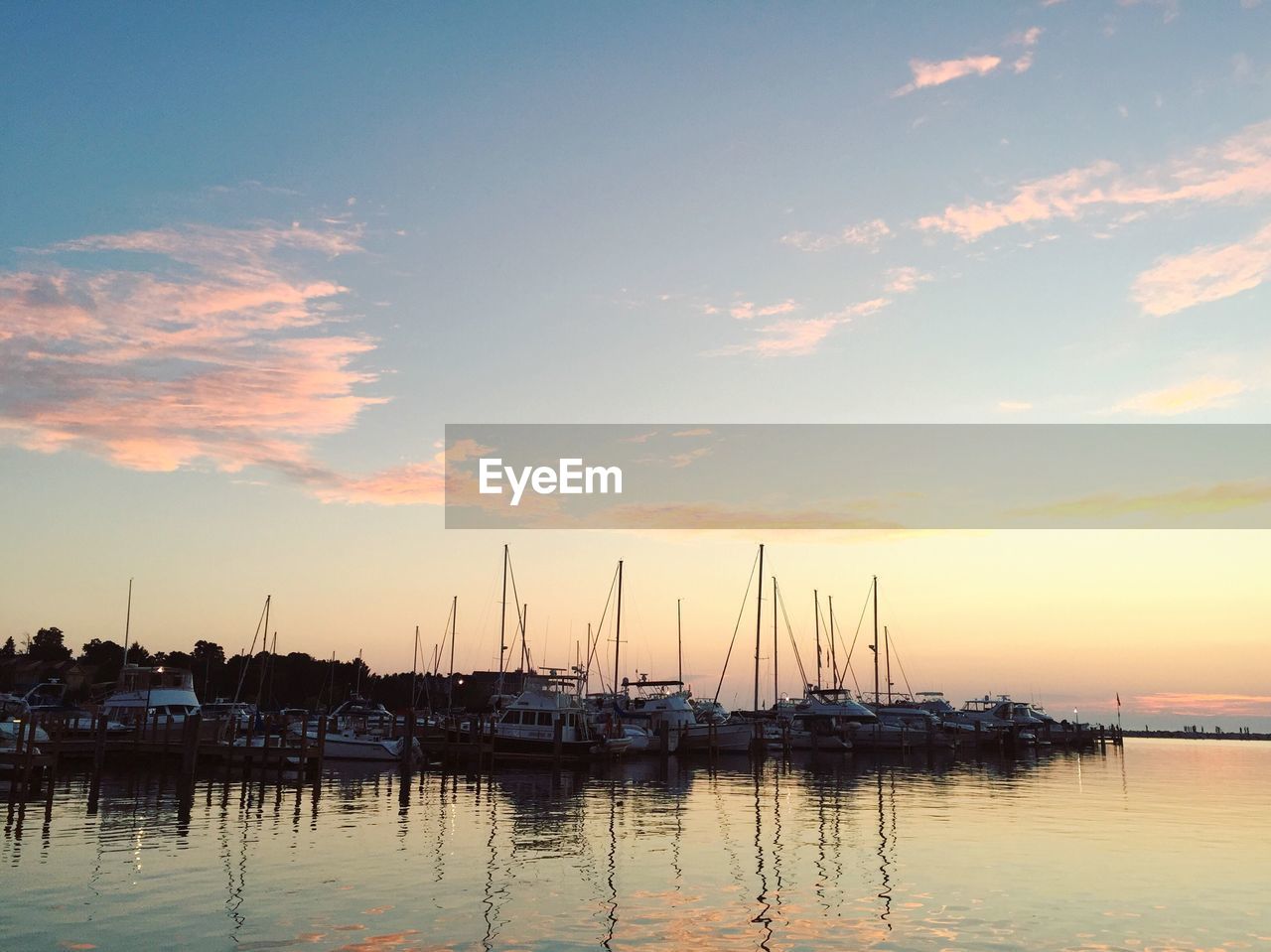 Boats moored in sea