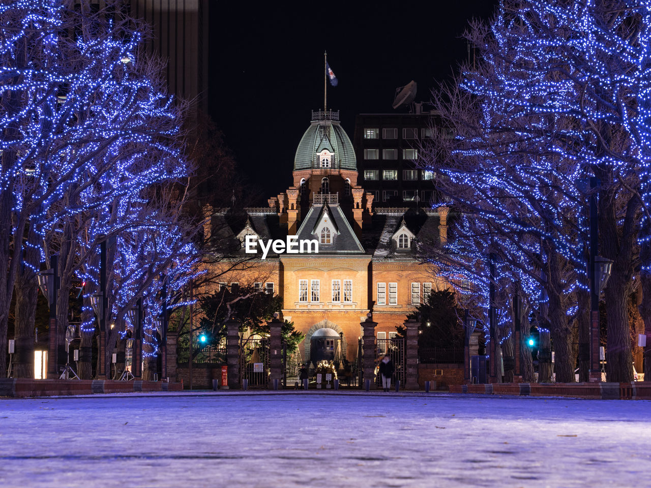 ILLUMINATED BUILDING AT NIGHT DURING WINTER