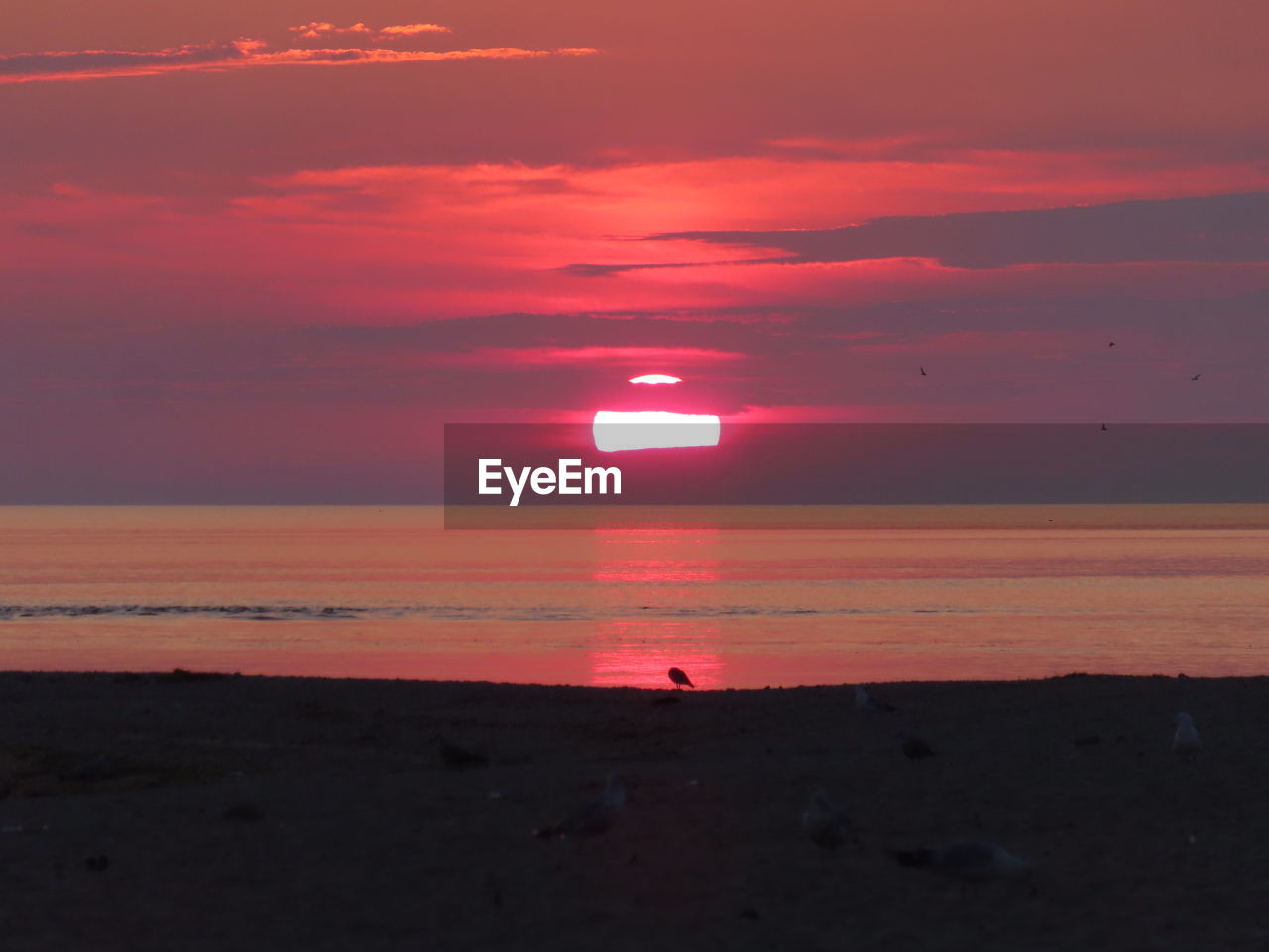 SCENIC VIEW OF SEA AGAINST ROMANTIC SKY