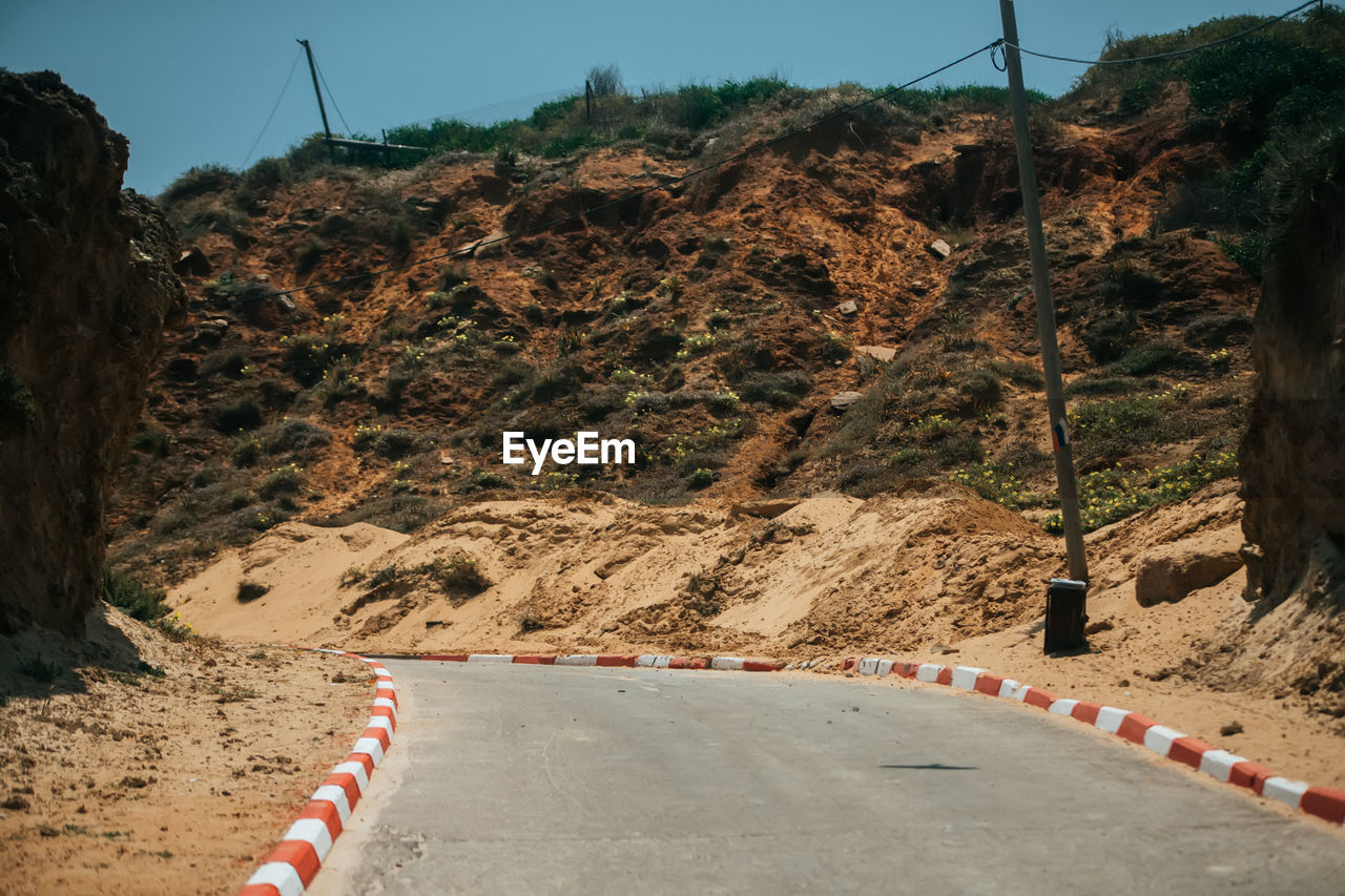 Road passing through rocks